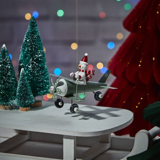 XMAS METAL SNOWMAN IN PLANE SPRING HANGER WITH GREEN PLANE