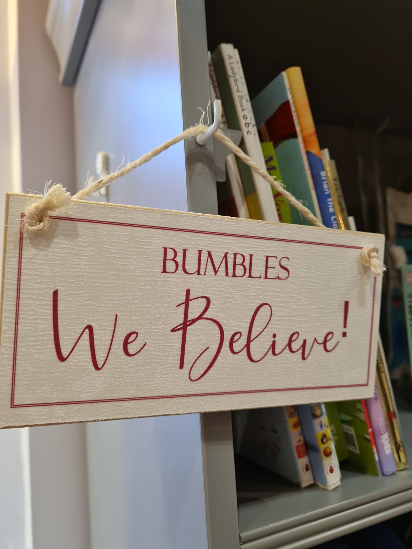 Bespoke We Believe sign