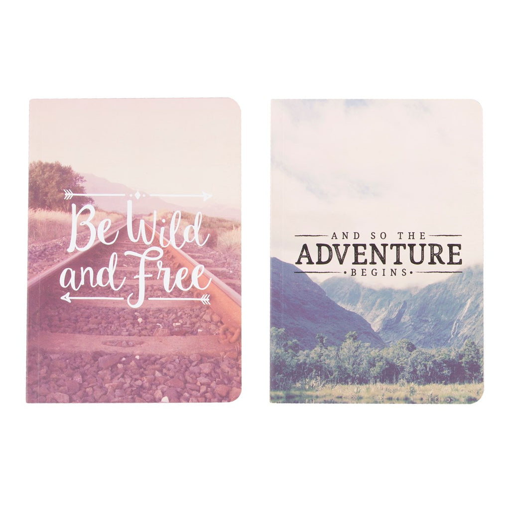 2 note books with inspirational travel quotes