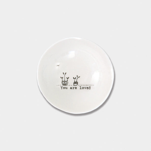 White plate with 'You Are Loved' quote